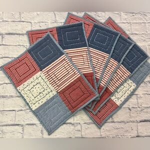6 count Red, white and blue quilted placemats. Standard 18X13 size.